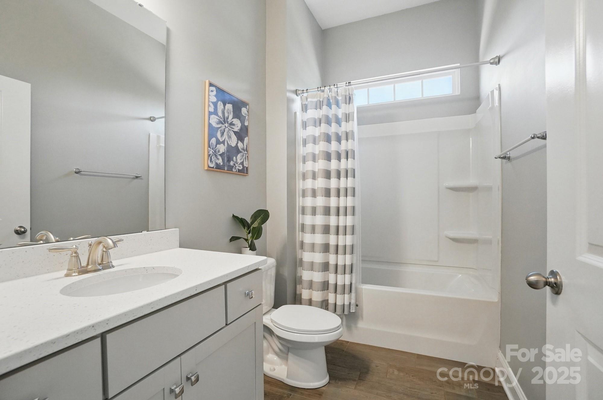 5004 Oakmere Road Waxhaw, NC 28173 - Photo 33 of 48 a bathroom with a sink toilet and shower