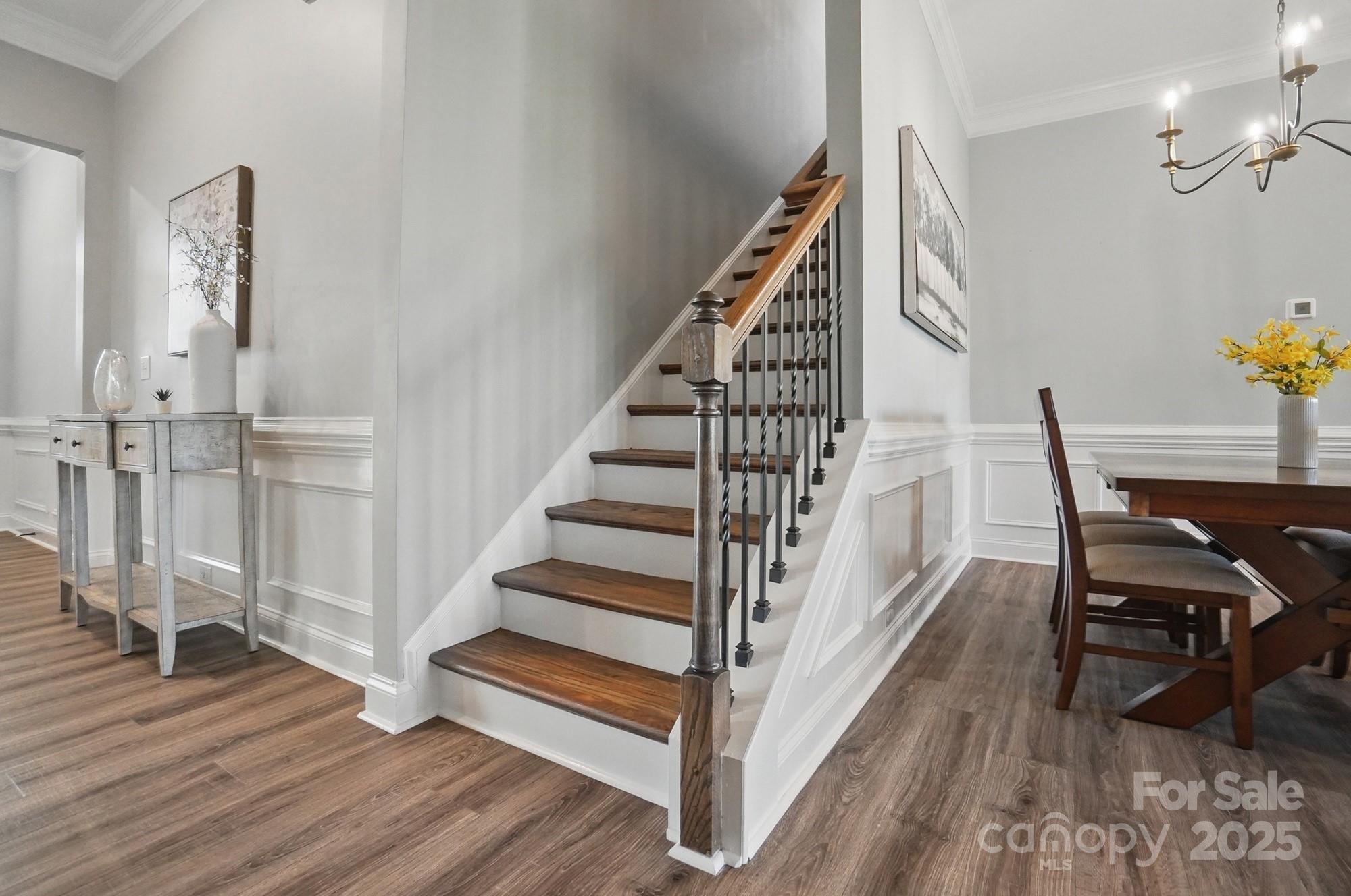 5004 Oakmere Road Waxhaw, NC 28173 - Photo 34 of 48 a view of entryway and hall with wooden floor