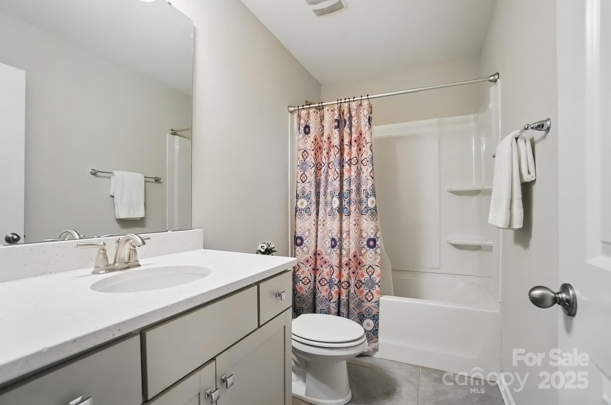 5004 Oakmere Road Waxhaw, NC 28173 - Photo 37 of 48 a bathroom with a sink toilet and shower