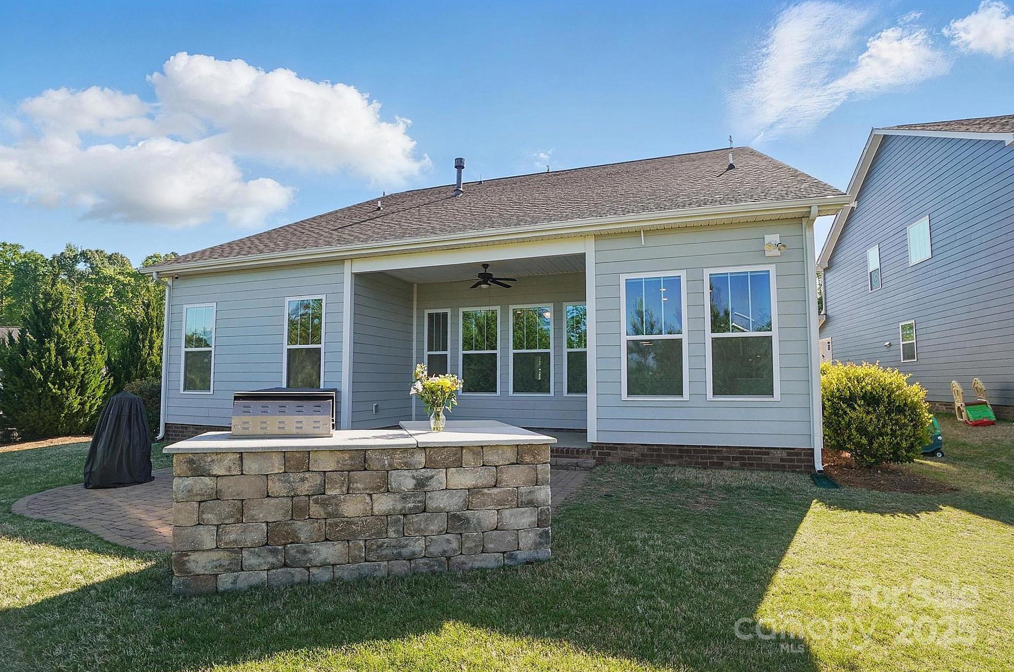 5004 Oakmere Road Waxhaw, NC 28173 - Photo 47 of 48 a front view of a house with patio