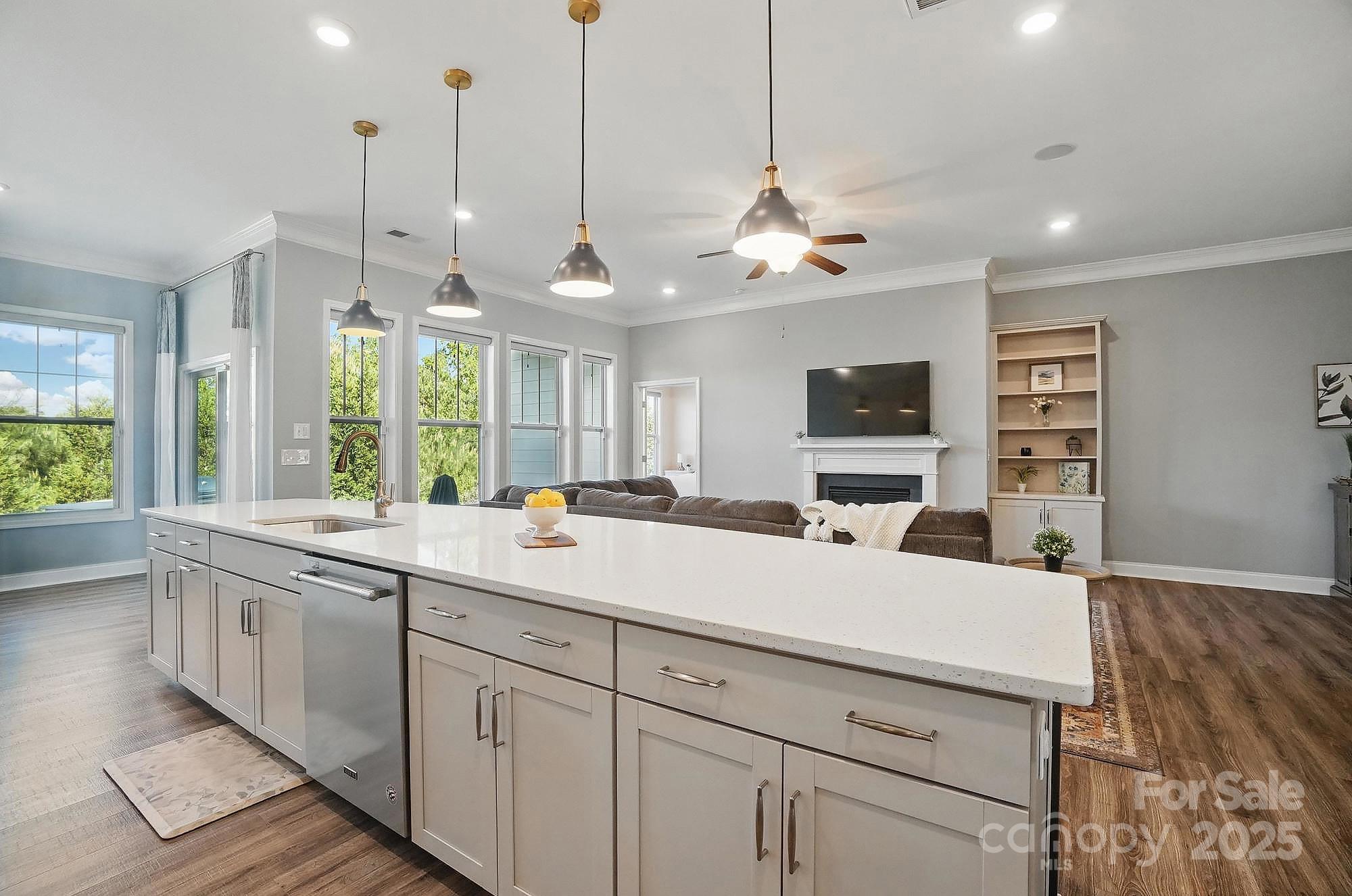 5004 Oakmere Road Waxhaw, NC 28173 - Photo 10 of 48 a kitchen with a sink and a large window
