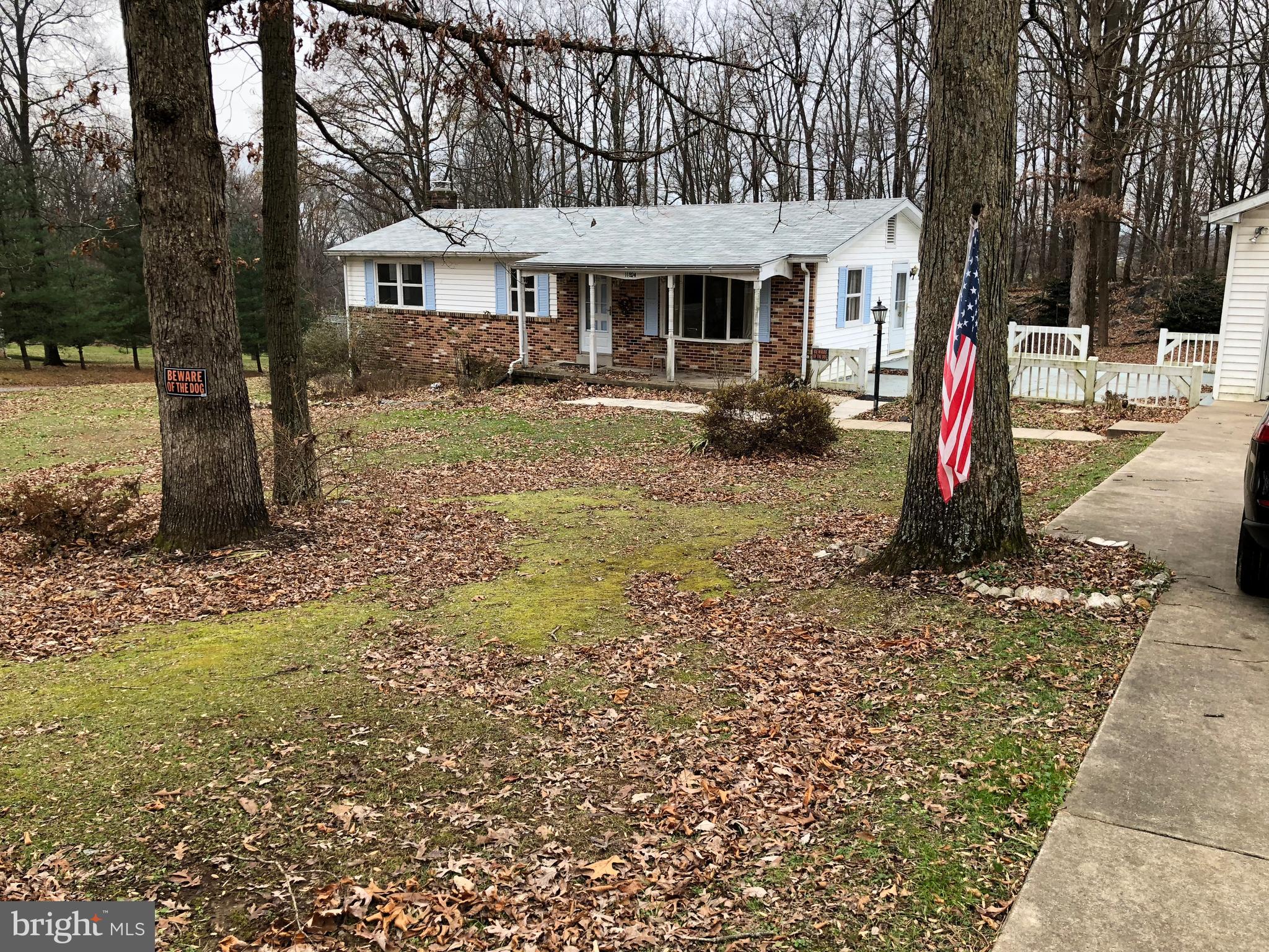 11804 Warner Road Keymar, MD 21757 - Photo 1 of 9 a front view of a house with a yard