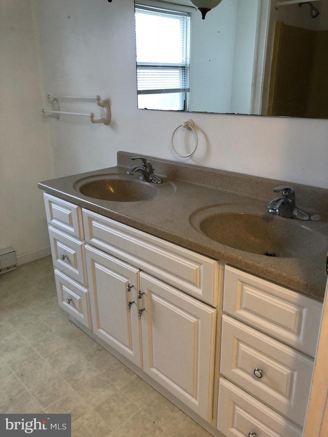 11804 Warner Road Keymar, MD 21757 - Photo 6 of 9 a bathroom with a sink and a mirror