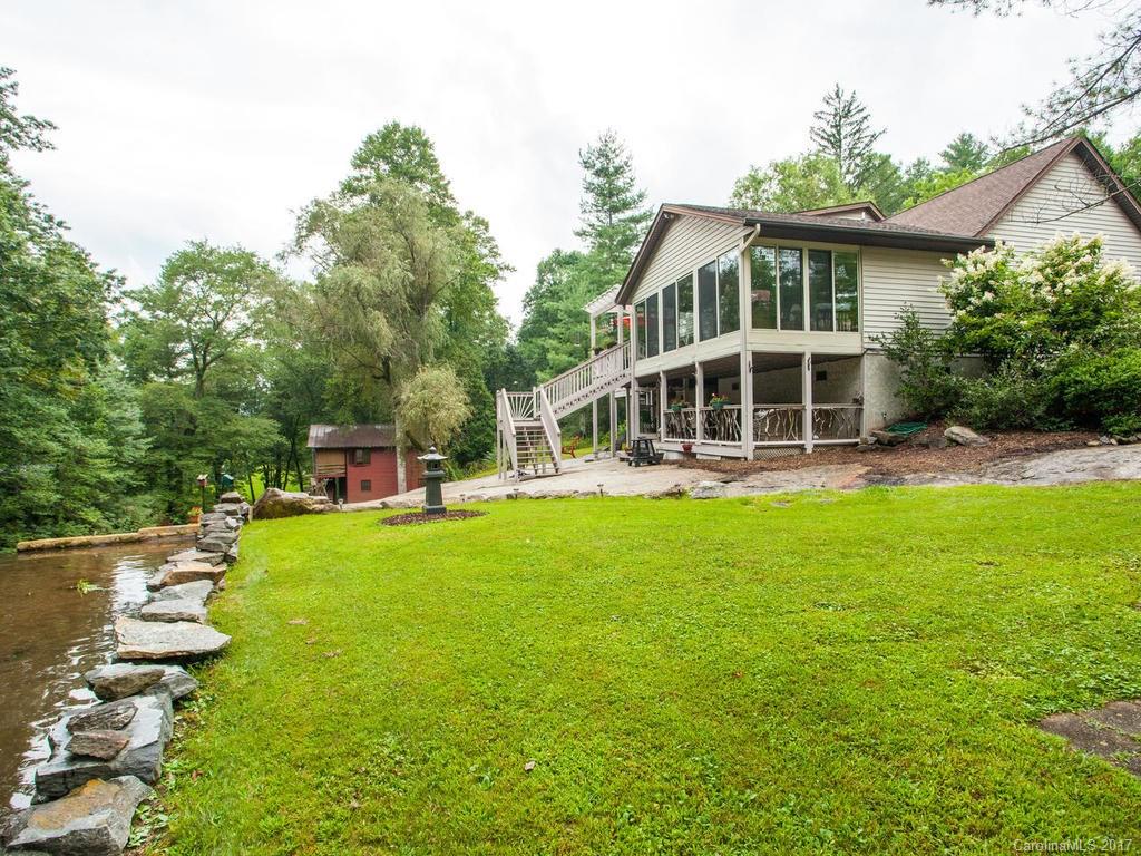3419 Hebron Road Hendersonville, NC 28739 - Photo 20 of 22 a view of a house with a yard balcony and sitting area