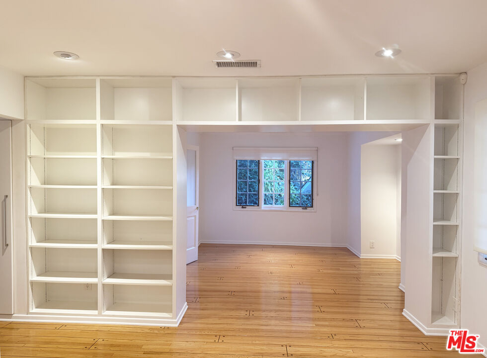4031 Hollyline Avenue Sherman Oaks, CA 91423 - Photo 4 of 31 a view of an empty room with a window