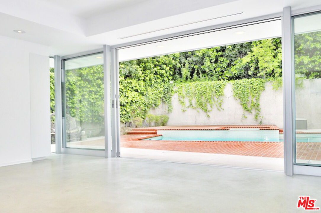 4031 Hollyline Avenue Sherman Oaks, CA 91423 - Photo 8 of 31 a view of a large window with an outdoor view