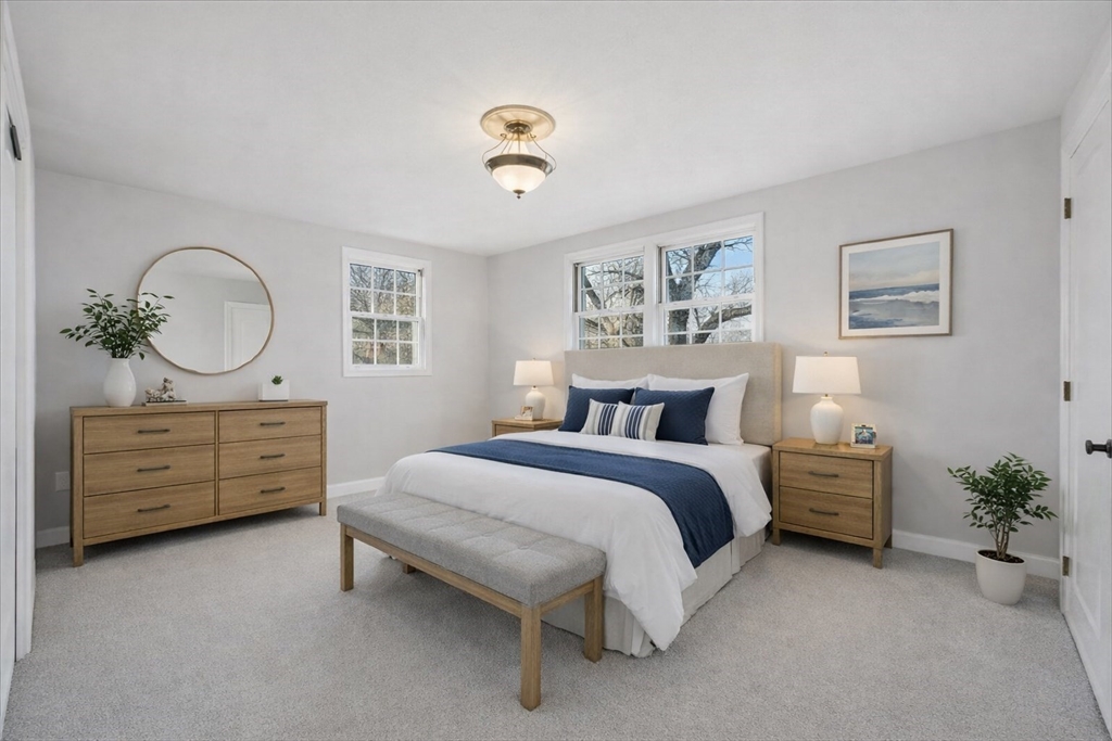 5 Pilgrim Circle, Unit C Methuen, MA 01844 - Photo 11 of 23 a bed room with a bed window and a dresser