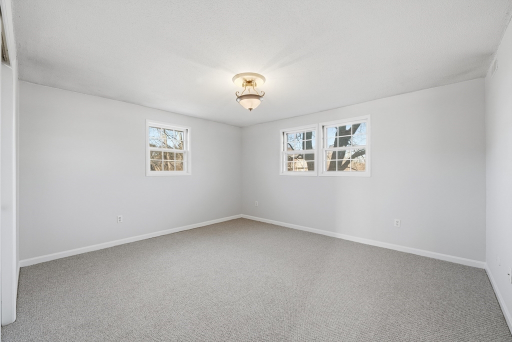 5 Pilgrim Circle, Unit C Methuen, MA 01844 - Photo 12 of 23 an empty room with a window