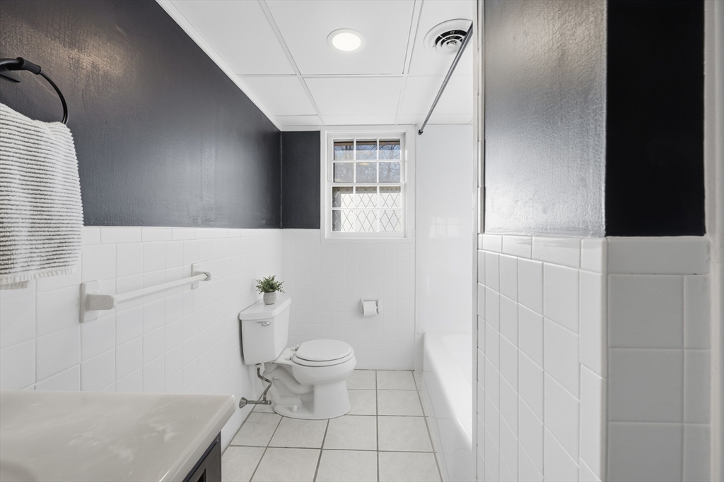 5 Pilgrim Circle, Unit C Methuen, MA 01844 - Photo 16 of 23 a bathroom with a toilet and a shower