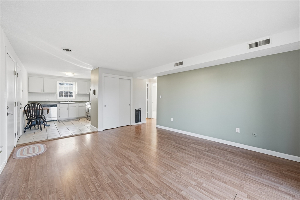 5 Pilgrim Circle, Unit C Methuen, MA 01844 - Photo 4 of 23 a view of a kitchen with a sink and microwave