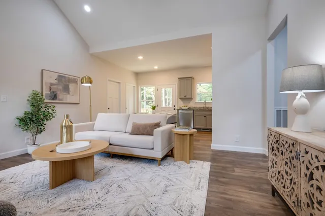 a living room with furniture and a couch