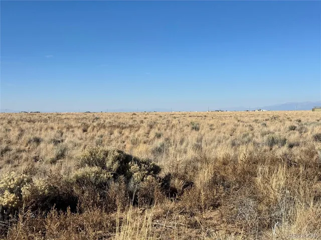 a view of a snow on the top of a mountain