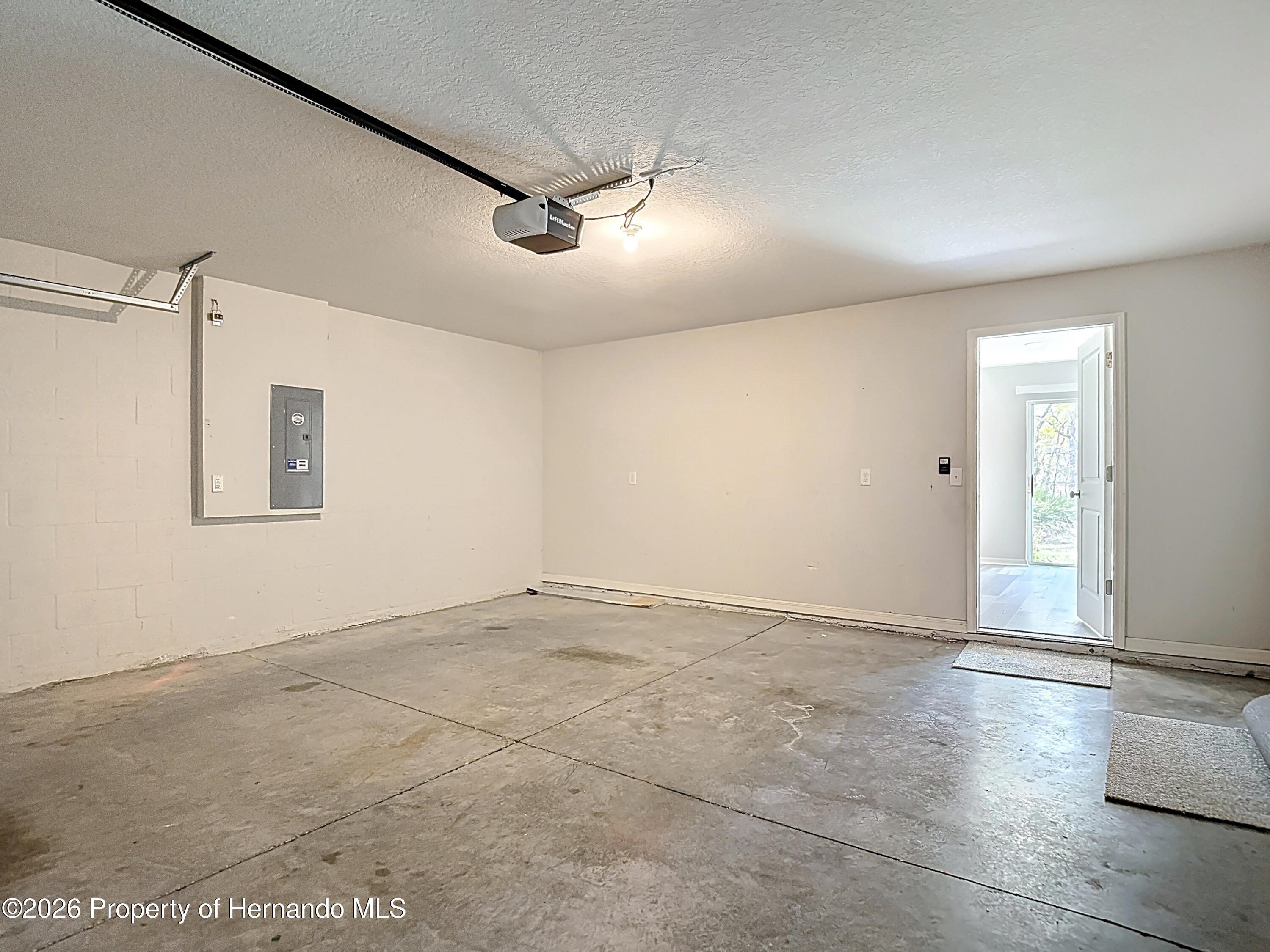 11374 Marcella Avenue Weeki Wachee, FL 34614 - Photo 61 of 70 a view of an empty room