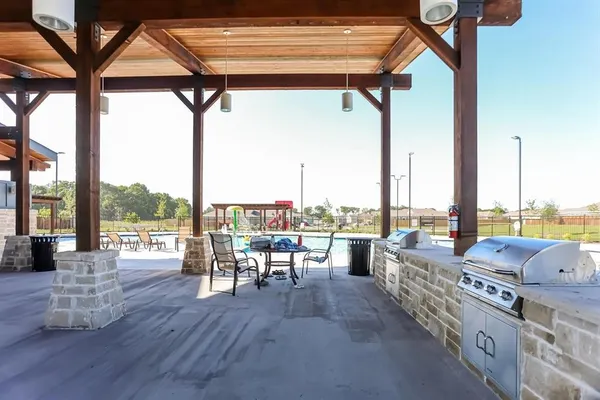 a view of a porch with a patio