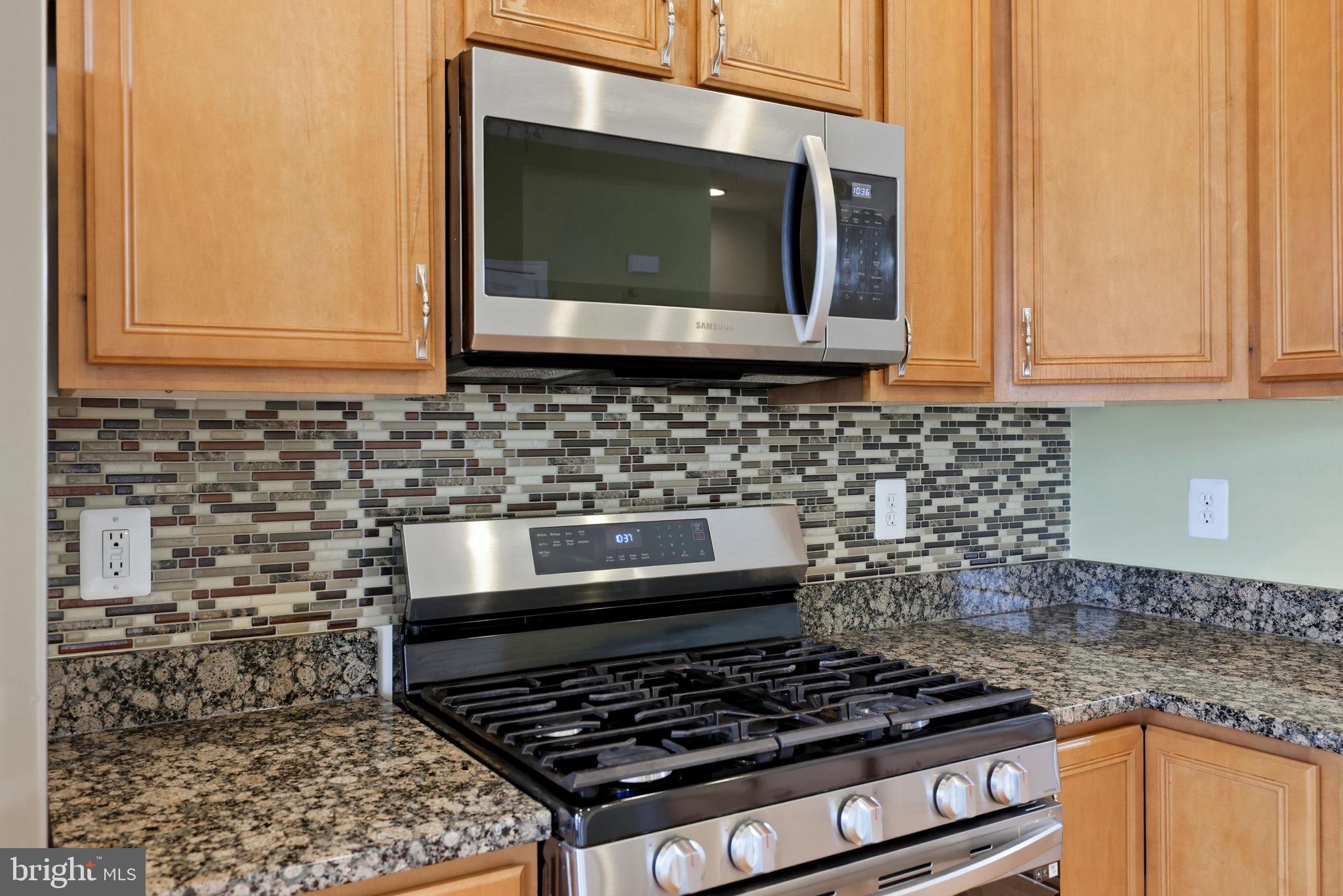 25156 Monteith Terrace Chantilly, VA 20152 - Photo 37 of 72 Modern kitchen with sleek finishes.
