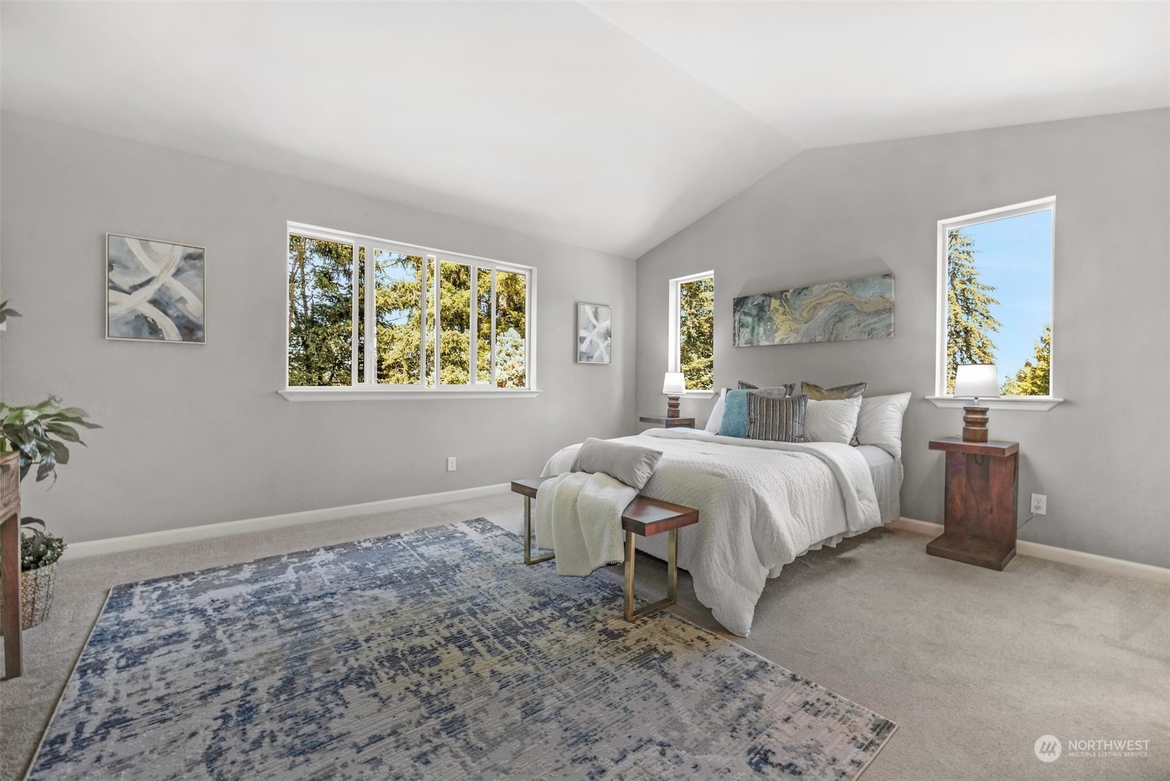 7 213th Street Southeast, Unit B Bothell, WA 98021 - Photo 16 of 34 a spacious bedroom with a bed and a window