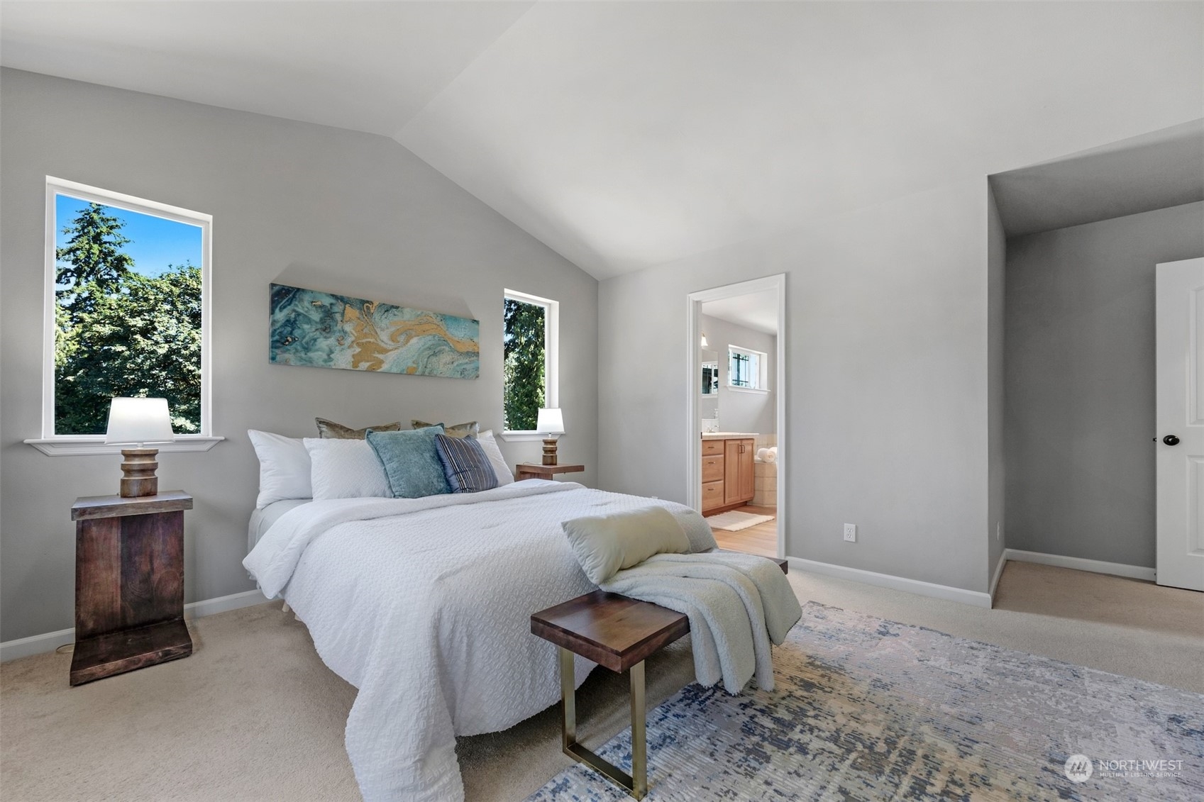 7 213th Street Southeast, Unit B Bothell, WA 98021 - Photo 17 of 34 a bedroom with a bed and windows