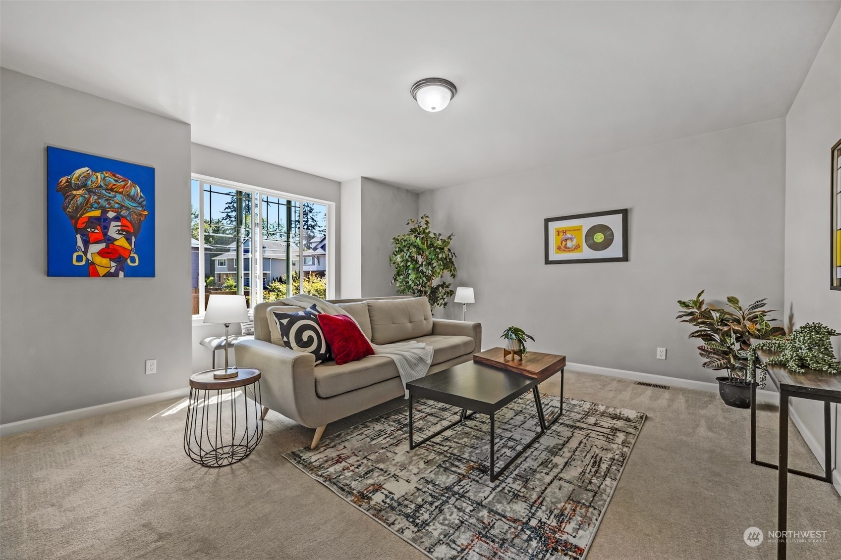 7 213th Street Southeast, Unit B Bothell, WA 98021 - Photo 23 of 34 a living room with furniture and a potted plant