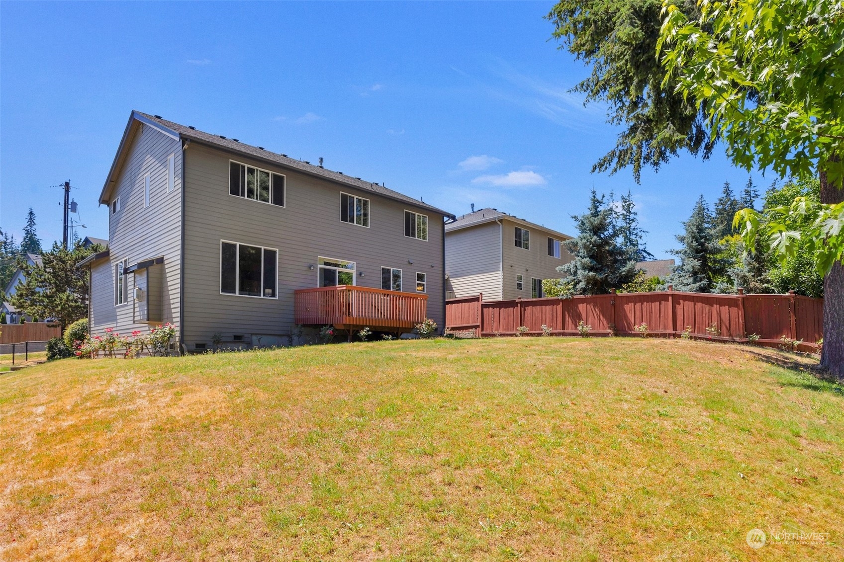 7 213th Street Southeast, Unit B Bothell, WA 98021 - Photo 29 of 34 a swimming pool with outdoor seating and yard