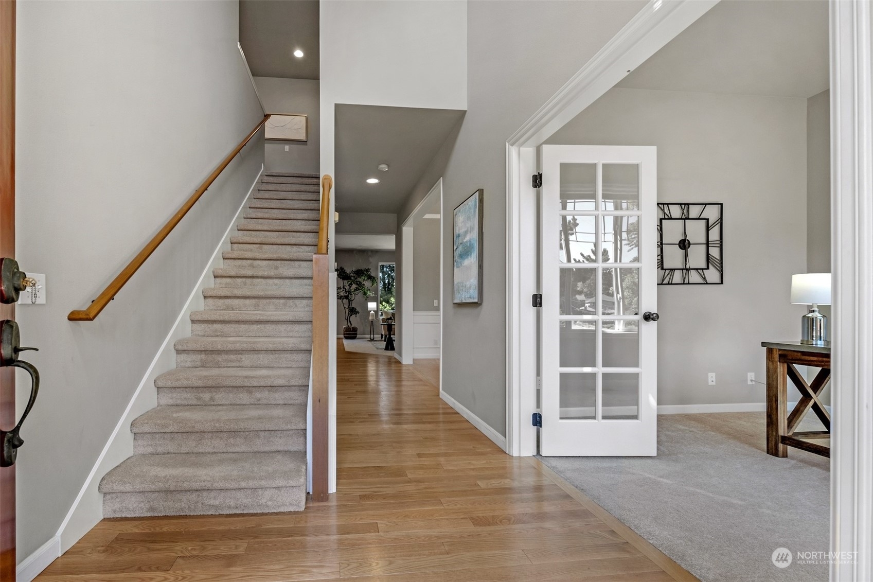 7 213th Street Southeast, Unit B Bothell, WA 98021 - Photo 3 of 34 a view of entryway and hall with wooden floor