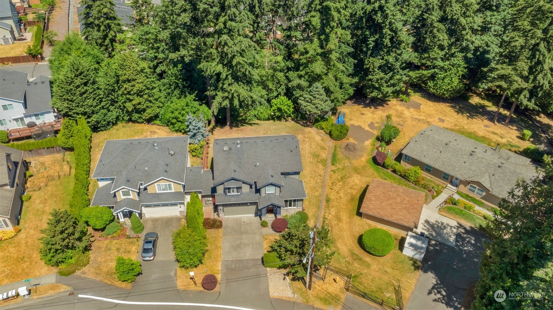 7 213th Street Southeast, Unit B Bothell, WA 98021 - Photo 33 of 34 an aerial view of residential houses with outdoor space and parking