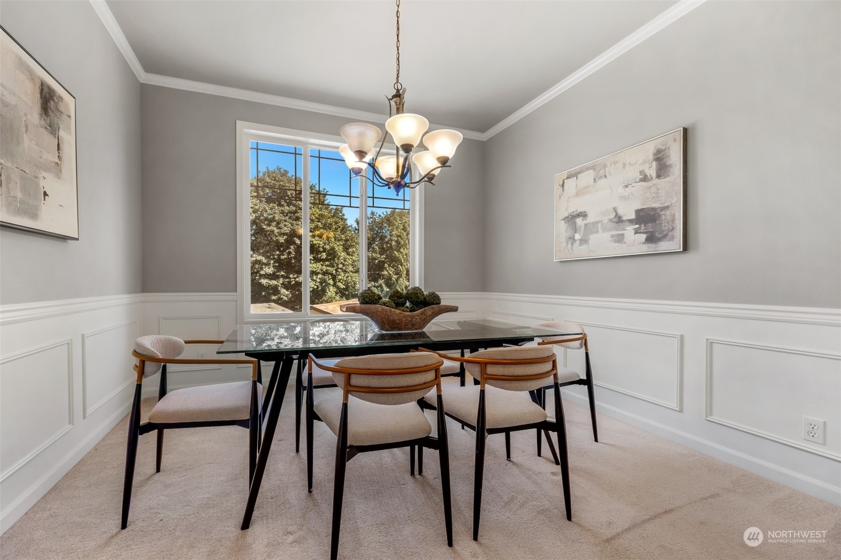 7 213th Street Southeast, Unit B Bothell, WA 98021 - Photo 5 of 34 a view of a dining room with furniture wooden floor and a chandelier
