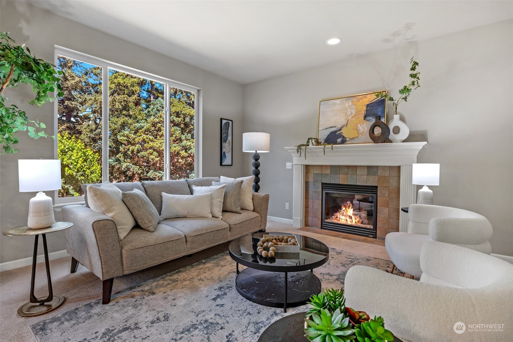 7 213th Street Southeast, Unit B Bothell, WA 98021 - Photo 7 of 34 a living room with furniture and a fireplace