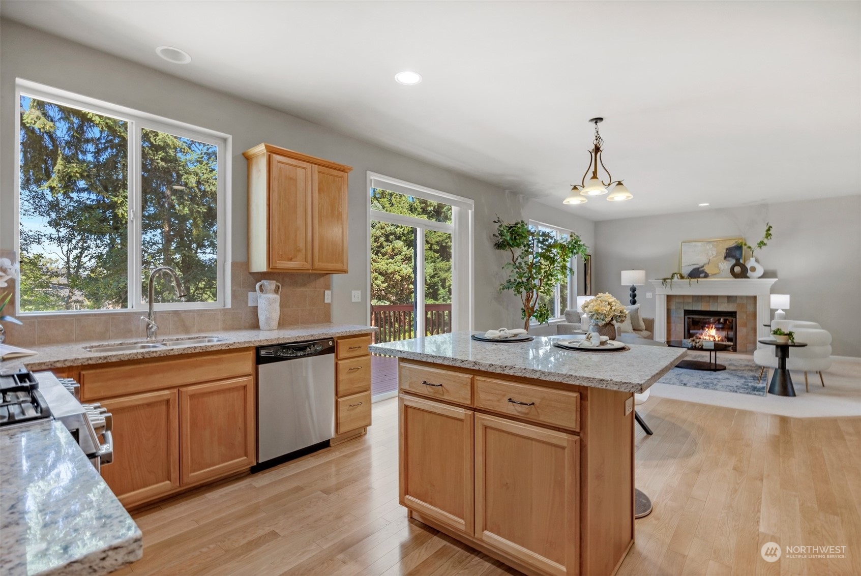 7 213th Street Southeast, Unit B Bothell, WA 98021 - Photo 9 of 34 a kitchen with sink cabinets and wooden floor