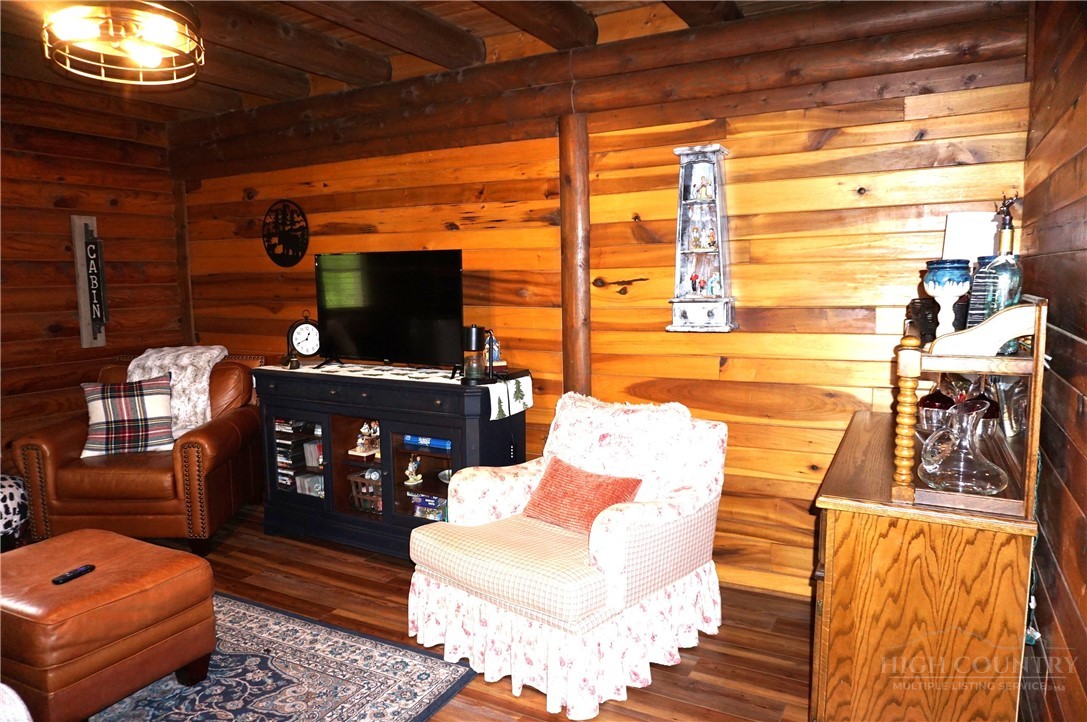 557 White Pine Road Newland, NC 28657 - Photo 7 of 41 a living room with furniture and a fireplace