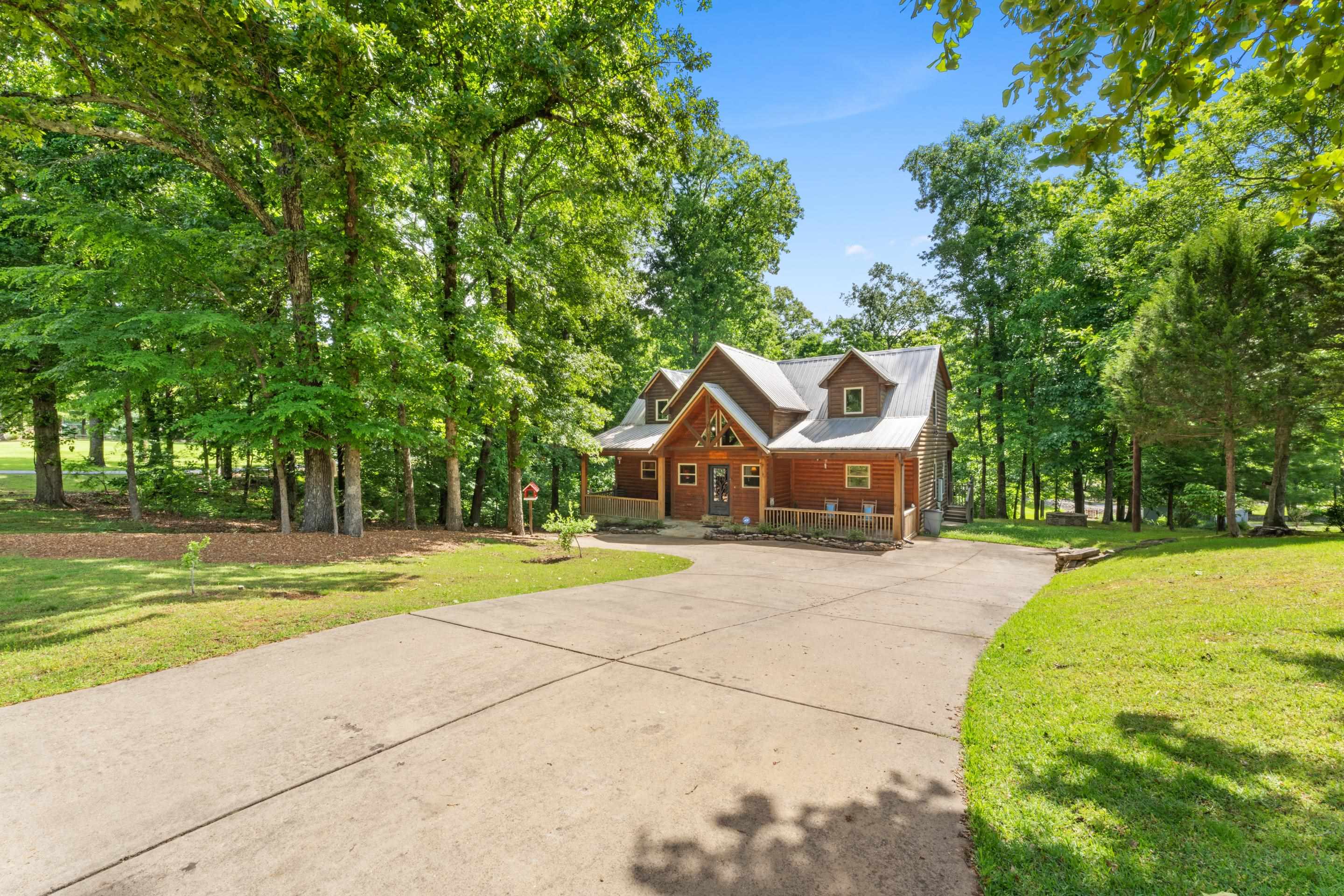 950 Cherry Road Eads, TN 38028 - Photo 1 of 30 Wood-sided home featuring a covered front porch and dormer windows