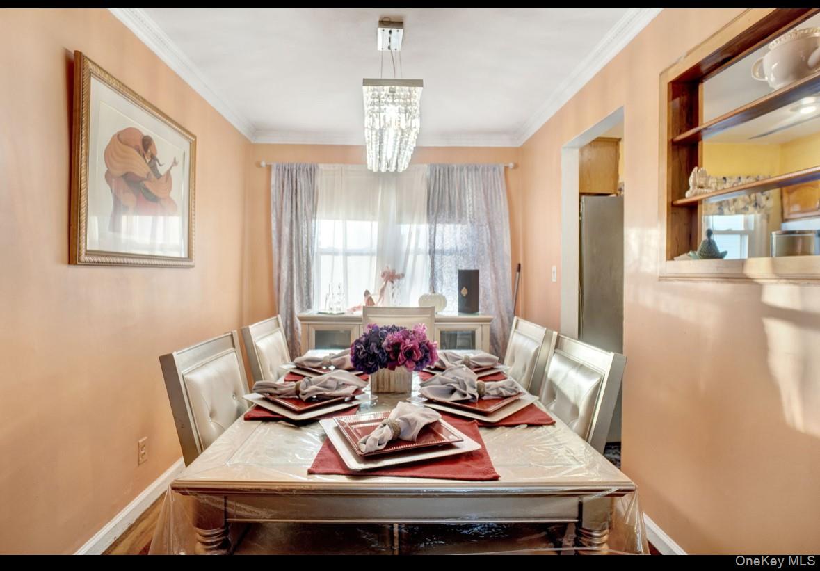 1024 Mahopac Road West Hempstead, NY 11552 - Photo 11 of 25 a view of a dining room with furniture window and outside view