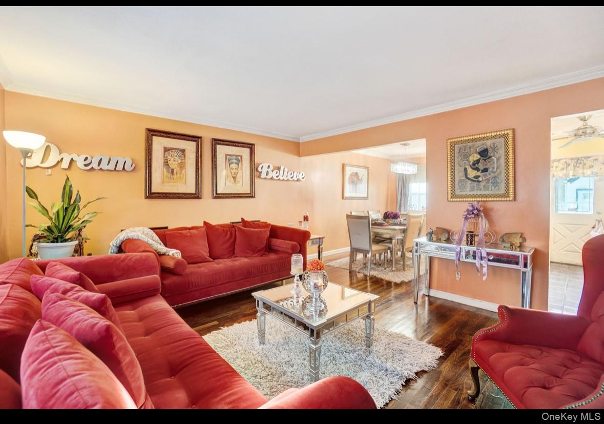 1024 Mahopac Road West Hempstead, NY 11552 - Photo 7 of 25 a living room with furniture and wooden floor