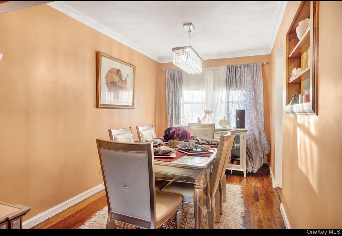 1024 Mahopac Road West Hempstead, NY 11552 - Photo 9 of 25 a dining room with furniture and window