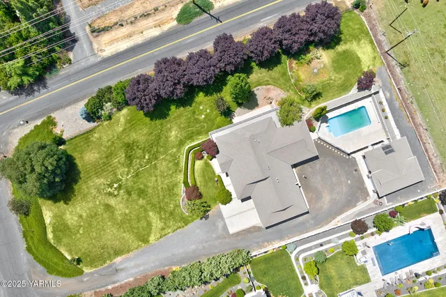 a view of swimming pool with a garden