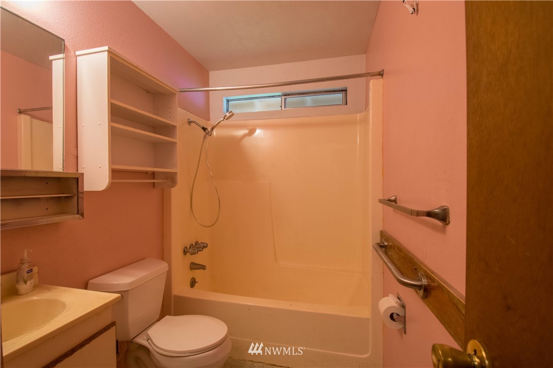 265 A Dieckman Road Chehalis, WA 98532 - Photo 6 of 20 a bathroom with a granite countertop bathtub shower sink vanity and toilet