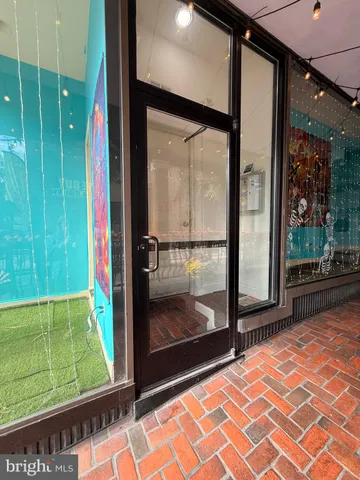 a view of a glass door of the house