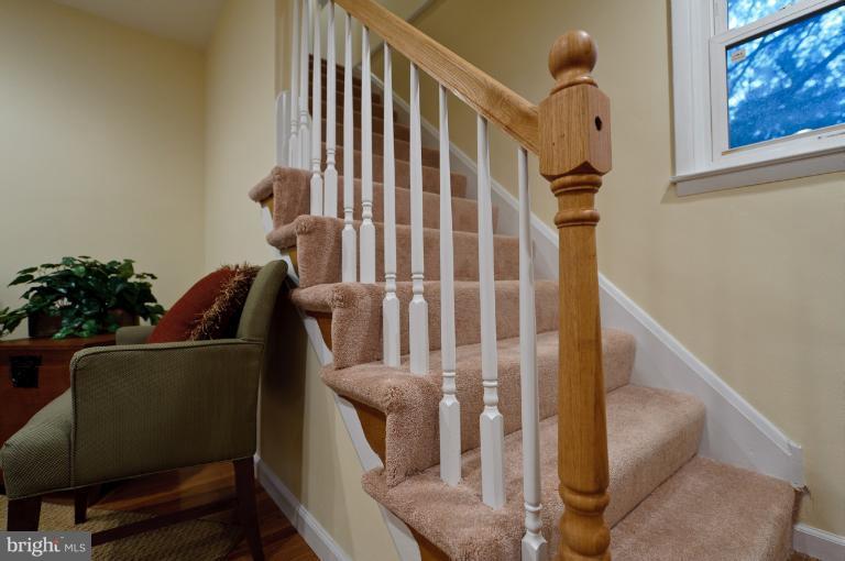 5305 Morello Road Baltimore, MD 21214 - Photo 15 of 24 Living Room Staircase