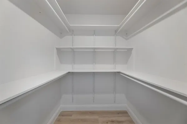 a view of an empty walk in closet