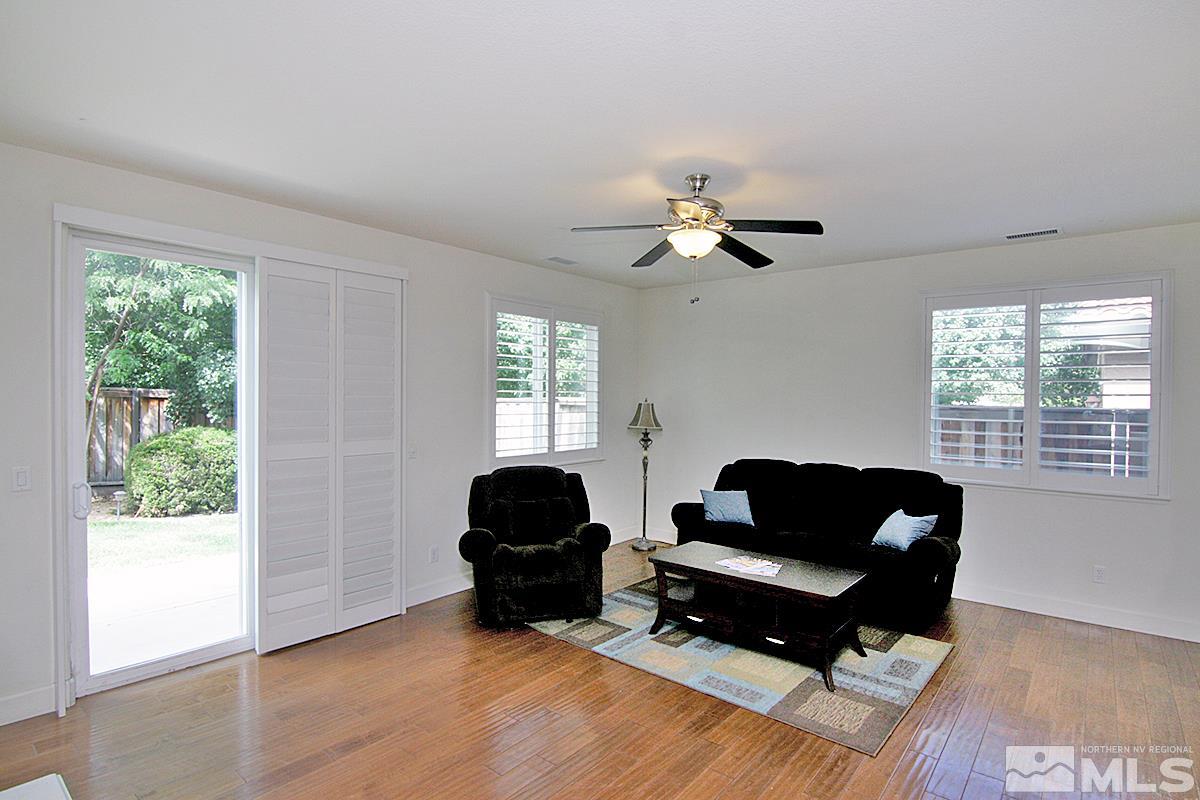 11215 Parma Way Reno, NV 89521 - Photo 10 of 22 a living room with furniture and a window
