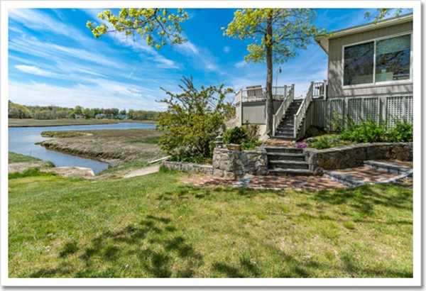 67 Border Street Scituate, MA 02066 - Photo 16 of 30 a view of a garden with a slide