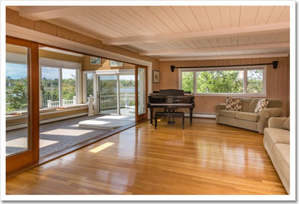 67 Border Street Scituate, MA 02066 - Photo 21 of 30 a living room with furniture and a table