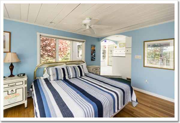 67 Border Street Scituate, MA 02066 - Photo 27 of 30 a bedroom with a bed and a window