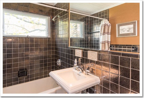 67 Border Street Scituate, MA 02066 - Photo 30 of 30 a bathroom with a sink shower and a mirror