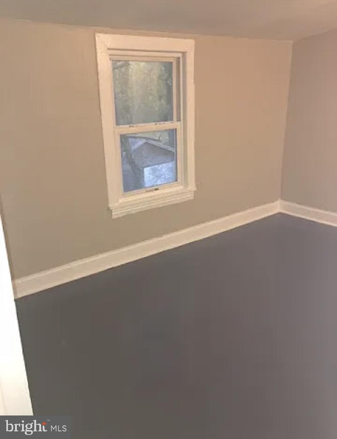 37 Olive Street Salem, NJ 08079 - Photo 6 of 19 an empty room with a window
