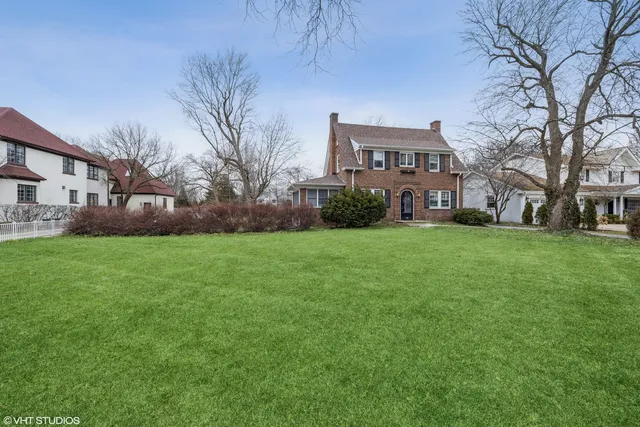 a view of a building with a yard
