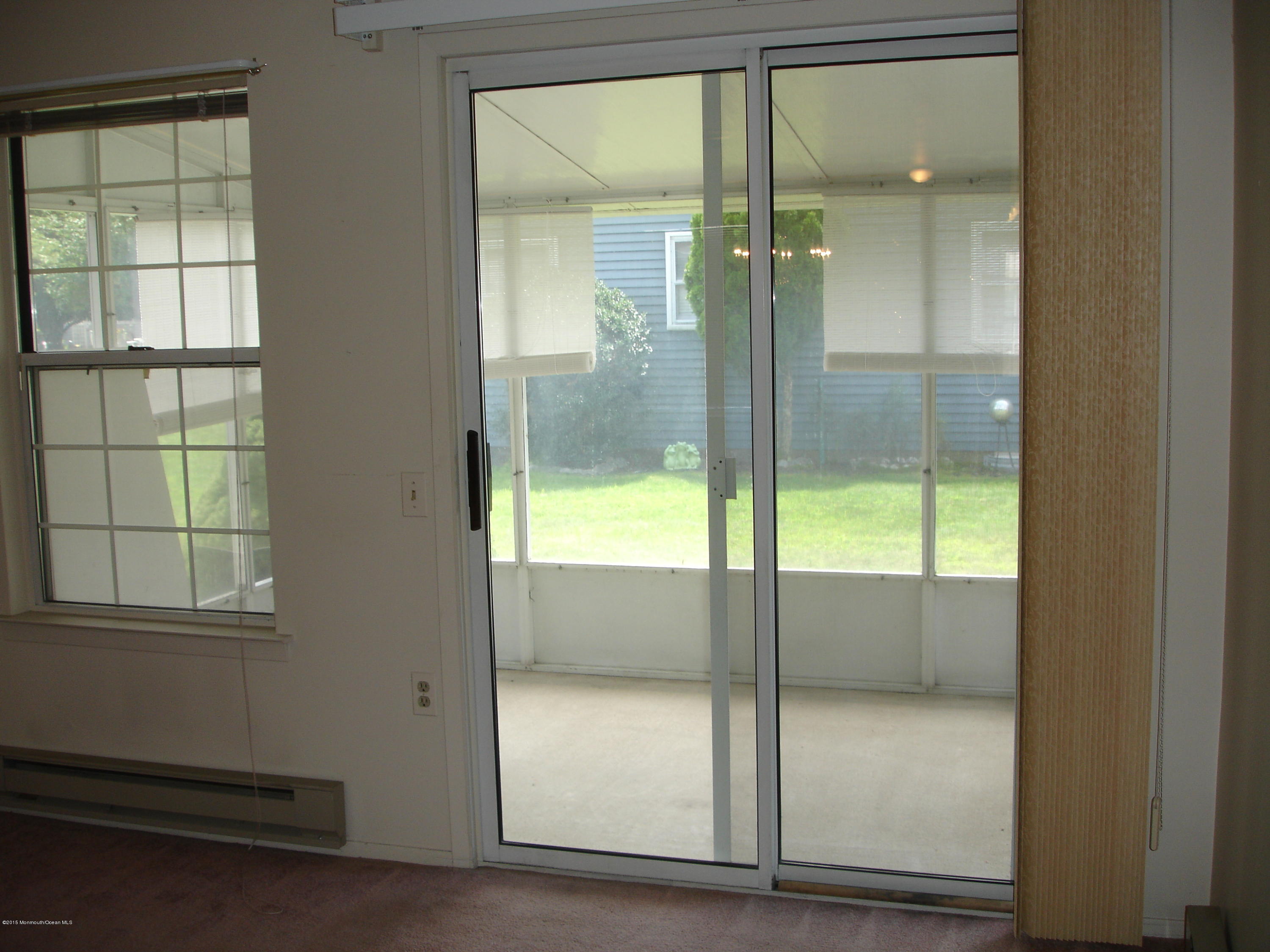 23B Mill Road, Unit B Whiting, NJ 08759 - Photo 13 of 22 a bathroom with a glass shower door