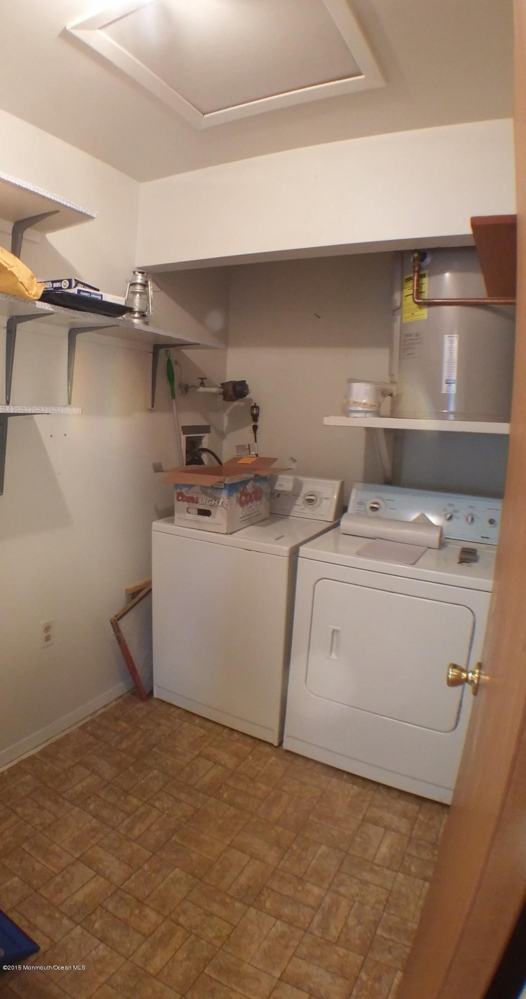 23B Mill Road, Unit B Whiting, NJ 08759 - Photo 21 of 22 a utility room with dryer and washer