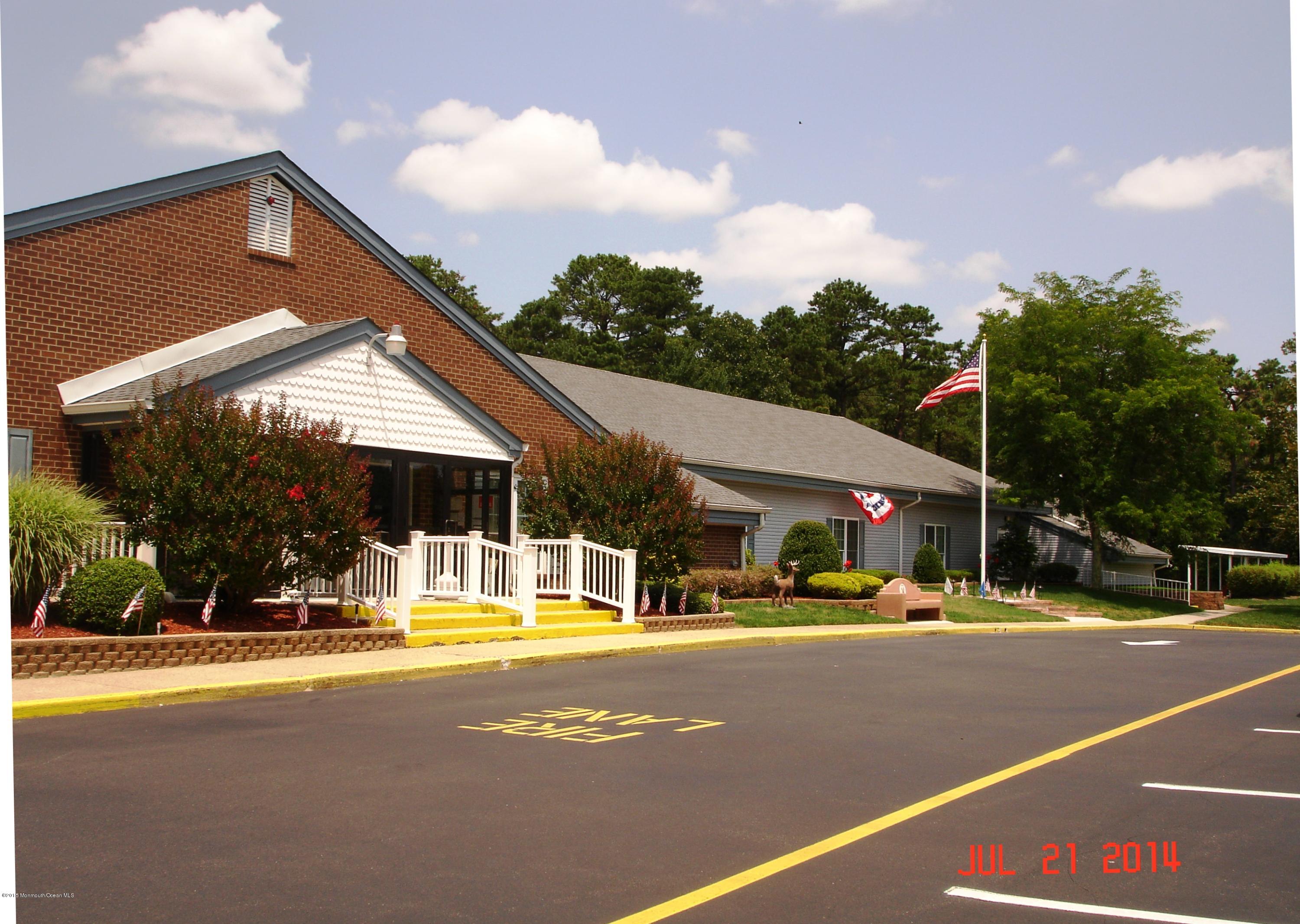 23B Mill Road, Unit B Whiting, NJ 08759 - Photo 22 of 22 a view of swimming pool with outdoor seating