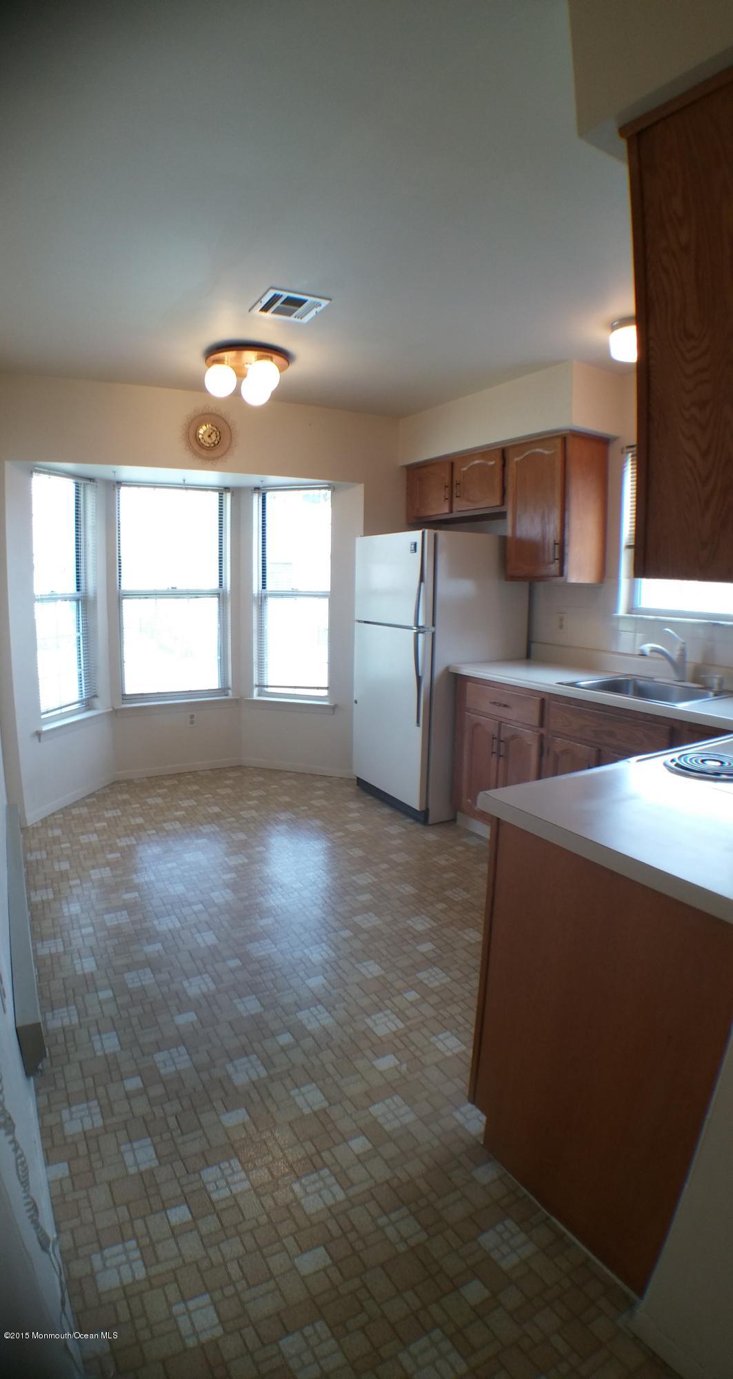 23B Mill Road, Unit B Whiting, NJ 08759 - Photo 6 of 22 wooden floor in an empty room with a window