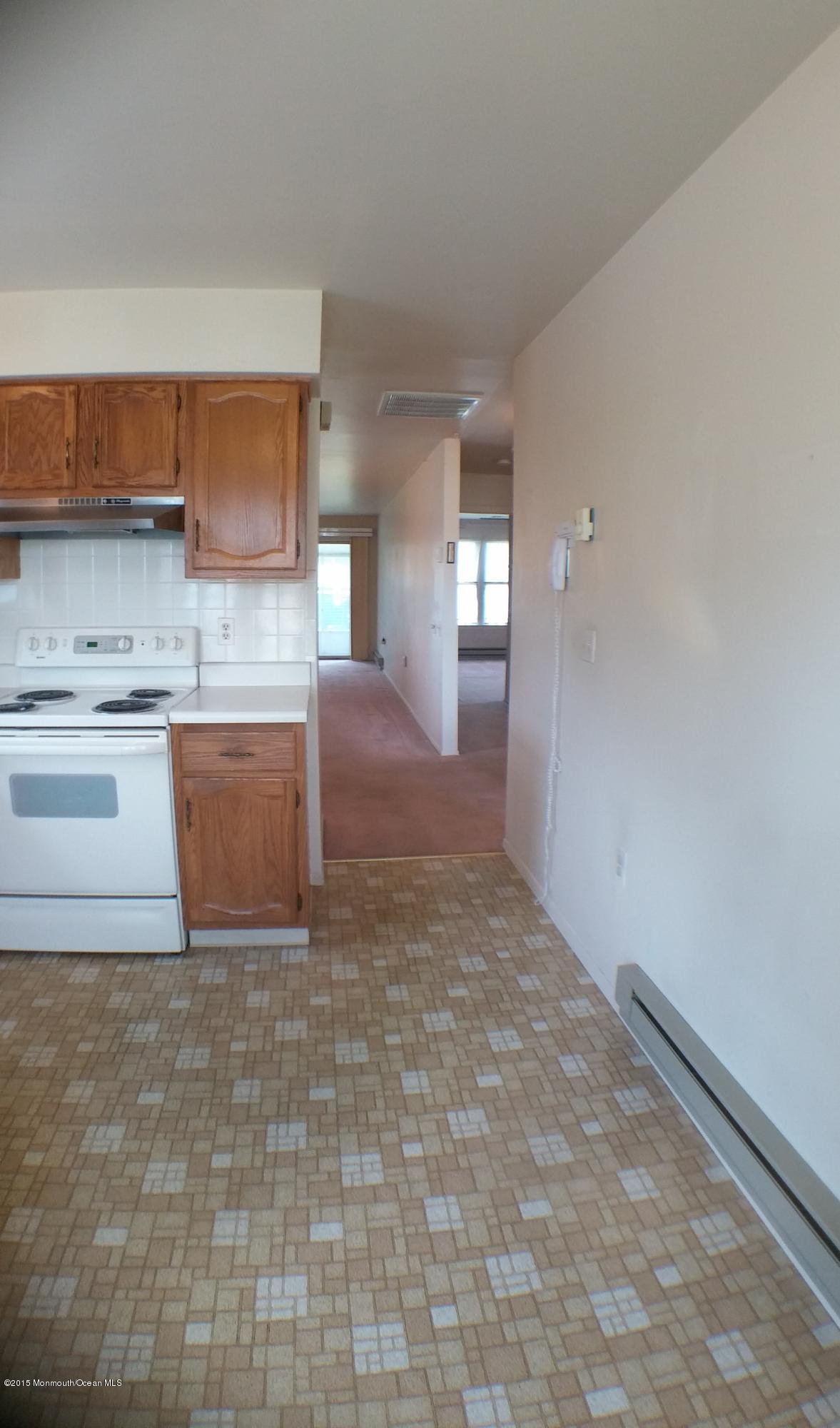 23B Mill Road, Unit B Whiting, NJ 08759 - Photo 9 of 22 a view of a kitchen with granite countertop cabinets